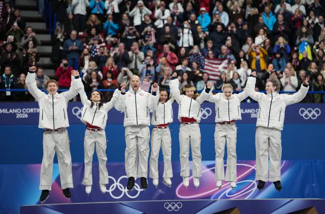 (260209) -- MILAN, Feb. 9, 2026 (Xinhua) -- Gold medalists team the United States jump on the podium during the awarding ceremony for the figure skating team event of the Milan-Cortina 2026 Olympic Winter Games in Milan, Italy, Feb. 8, 2026. (Xinhua/Xue Yuge)