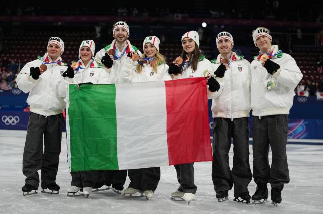 (260209) -- MILAN, Feb. 9, 2026 (Xinhua) -- Bronze medalists team Italy pose for photos after the awarding ceremony for the figure skating team event of the Milan-Cortina 2026 Olympic Winter Games in Milan, Italy, Feb. 8, 2026. (Xinhua/Xue Yuge)