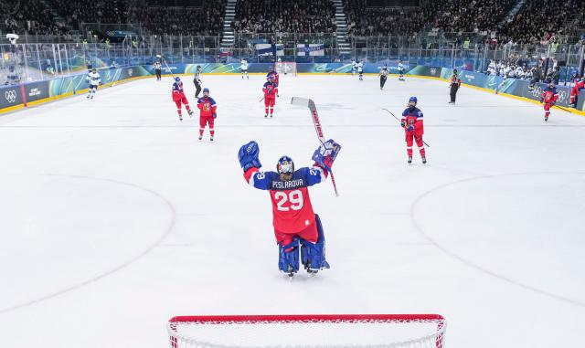 (260208) -- MILAN, Feb. 8, 2026 (Xinhua) -- Goalkeeper Klara Peslarova (C) of the Czech Republic celebrates after the ice hockey women's preliminary round group A match between the Czech Republic and Finland at the Milan-Cortina 2026 Olympic Winter Games in Milan, Italy, Feb. 8, 2026. (Xinhua/Sun Fei)