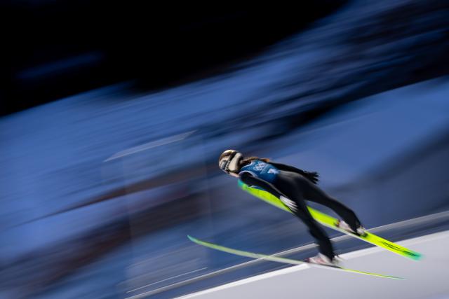 (260209) -- PREDAZZO, Feb. 9, 2026 (Xinhua) -- Emma Chervet of France competes during the Ski Jumping Women's Normal Hill third Official Training of the 2026 Milan-Cortina Winter Olympics in Predazzo, Italy, Feb. 8, 2026. (Xinhua/Huang Wei)