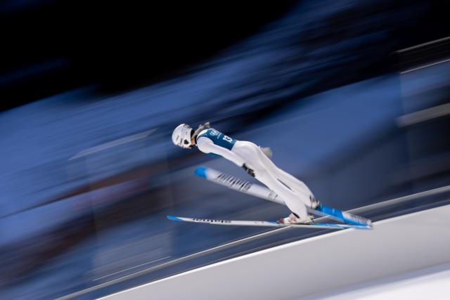 (260209) -- PREDAZZO, Feb. 9, 2026 (Xinhua) -- Daniela Vasilica Toth of Romania competes during the Ski Jumping Women's Normal Hill third Official Training of the 2026 Milan-Cortina Winter Olympics in Predazzo, Italy, Feb. 8, 2026. (Xinhua/Huang Wei)