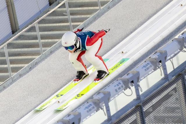 (260209) -- PREDAZZO, Feb. 9, 2026 (Xinhua) -- Klara Ulrichova of the Czech Republic competes during the Ski Jumping Women's Normal Hill third Official Training of the 2026 Milan-Cortina Winter Olympics in Predazzo, Italy, Feb. 8, 2026. (Xinhua/Huang Wei)