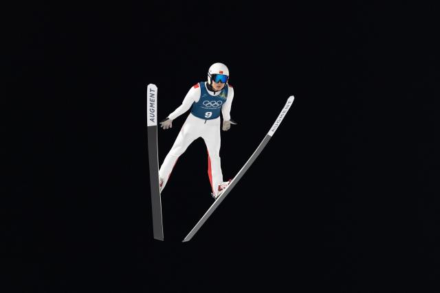 (260209) -- PREDAZZO, Feb. 9, 2026 (Xinhua) -- Song Qiwu of China competes during the Ski Jumping Men's Normal Hill second Official Training of the 2026 Milan-Cortina Winter Olympics in Predazzo, Italy, Feb. 8, 2026. (Xinhua/Huang Wei)