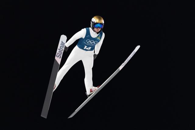 (260209) -- PREDAZZO, Feb. 9, 2026 (Xinhua) -- Yevhen Marusiak of Ukraine competes during the Ski Jumping Men's Normal Hill second Official Training of the 2026 Milan-Cortina Winter Olympics in Predazzo, Italy, Feb. 8, 2026. (Xinhua/Huang Wei)