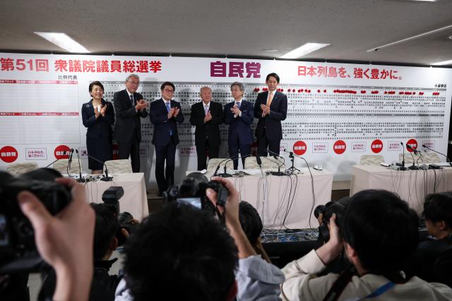(260209) -- TOKYO, Feb. 9, 2026 (Xinhua) -- Liberal Democratic Party (LDP) Secretary-General Shunichi Suzuki (3rd R, back) celebrates with other members at the headquarters of the LDP in Tokyo, Japan, Feb. 8, 2026. Japan's ruling coalition of the LDP and the Japan Innovation Party (JIP) won more than a two-thirds majority in the House of Representatives following Sunday's general election, public broadcaster NHK reported early Monday. (Kim Kyung-Hoon/Pool via Xinhua)
