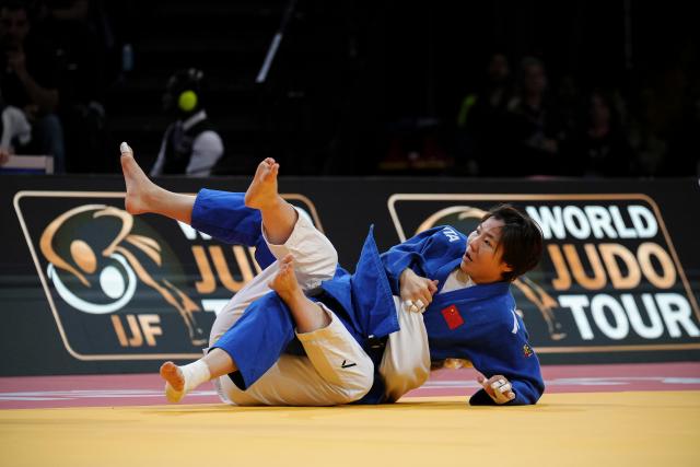 (260209) --  PARIS, Feb. 9, 2026 (Xinhua) -- China's Feng Yingying (R) and Denmark's Olsen Laerke compete in the Women's -70kg category round of 32 match at the Grand Slam judo competition in Paris, France, on Feb. 8, 2026. (Photo by Aurelien Morissard/Xinhua)