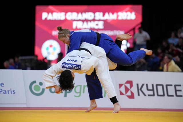 (260209) --  PARIS, Feb. 9, 2026 (Xinhua) -- China's Ma Zhenzhao (bottom) and Canada's Godbout Coralie compete in the Women's -78kg category round of 16 match at the Grand Slam judo competition in Paris, France, on Feb. 8, 2026. (Photo by Aurelien Morissard/Xinhua)