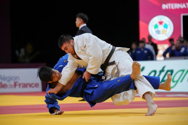 (260209) --  PARIS, Feb. 9, 2026 (Xinhua) -- China's Yang Yang (L) and Russia's Bifov Idar compete in the Men's -100kg category round of 64 match at the Grand Slam judo competition in Paris, France, on Feb. 8, 2026. (Photo by Aurelien Morissard/Xinhua)