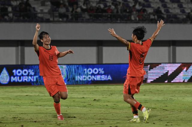 (260209) -- TANGERANG. Feb. 9, 2026 (Xinhua) -- Wang Heyi (L) of China celebrates his goal with his teammate Shuai Weiho during the U17 International Friendly Match between China and Indonesia in Tangerang, Indonesia on Feb. 8, 2026. (Xinhua/Veri Sanovri)