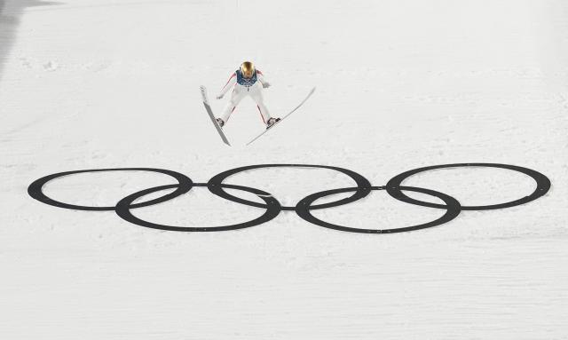 (260209) -- BEIJING, Feb. 9, 2026 (Xinhua) -- Zeng Ping of China competes during the ski jumping women's normal hill individual at the Milan-Cortina 2026 Olympic Winter Games in Predazzo, Italy, Feb. 7, 2026. (Xinhua/Meng Yongmin)