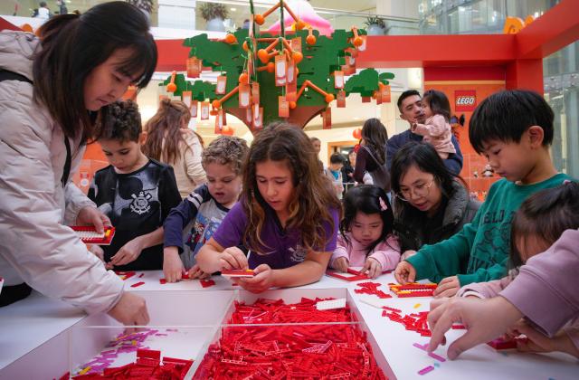 (260209) -- BURNABY, Feb. 9, 2026 (Xinhua) -- People build Chinese New Year-themed LEGO models during a LEGO pop-up event to celebrate the upcoming Year of the Horse at Metrotown Shopping Mall in Burnaby, British Columbia, Canada, on Feb. 8, 2026. (Photo by Liang Sen/Xinhua)