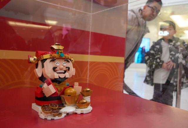 (260209) -- BURNABY, Feb. 9, 2026 (Xinhua) -- A God of Fortune LEGO model is displayed during a LEGO pop-up event to celebrate the upcoming Year of the Horse at Metrotown Shopping Mall in Burnaby, British Columbia, Canada, on Feb. 8, 2026. (Photo by Liang Sen/Xinhua)