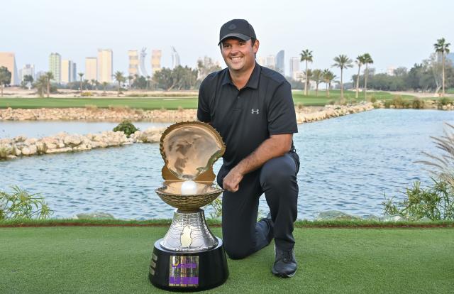 (260209) -- DOHA, Feb. 9, 2026 (Xinhua) -- Patrick Reed of the United States poses with the trophy after winning the Qatar Masters 2026 golf tournament at the Doha Golf Club in Doha, Qatar, Feb. 8, 2026. (Photo by Nikku/Xinhua)