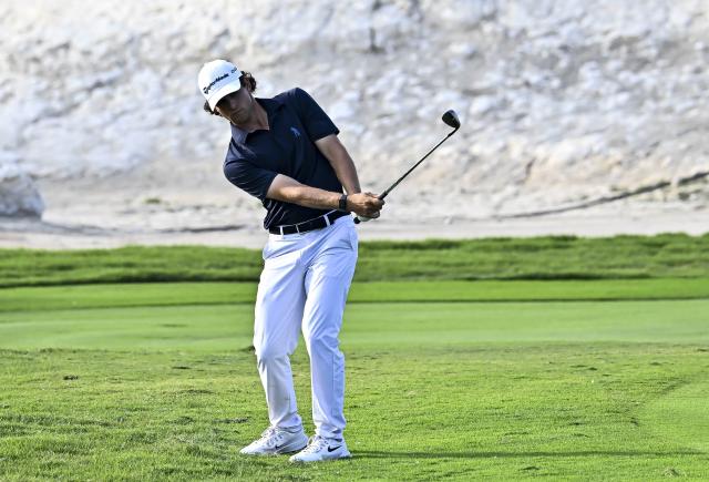 (260209) -- DOHA, Feb. 9, 2026 (Xinhua) -- Angel Ayora of Spain hits the ball during the final round of the Qatar Masters 2026 golf tournament at the Doha Golf Club in Doha, Qatar, Feb. 8, 2026. (Photo by Nikku/Xinhua)