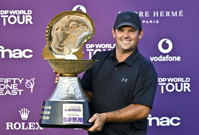 (260209) -- DOHA, Feb. 9, 2026 (Xinhua) -- Patrick Reed of the United States poses with the trophy after winning the Qatar Masters 2026 golf tournament at the Doha Golf Club in Doha, Qatar, Feb. 8, 2026. (Photo by Nikku/Xinhua)