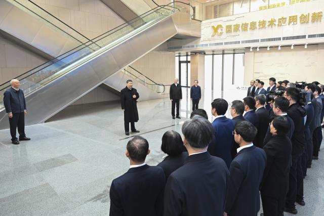 (260209) -- BEIJING, Feb. 9, 2026 (Xinhua) -- Chinese President Xi Jinping, also general secretary of the Communist Party of China Central Committee and chairman of the Central Military Commission, visits an information technology (IT) innovation park in Beijing, capital of China, Feb. 9, 2026. At the park, Xi learned about IT application and innovation, and was briefed on Beijing's efforts to expedite the development of an international sci-tech innovation center.
   Xi checked the display of sci-tech innovation outcomes, and talked with researchers and heads of sci-tech enterprises. (Xinhua/Yan Yan)