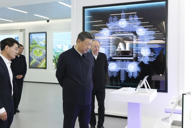 (260209) -- BEIJING, Feb. 9, 2026 (Xinhua) -- Chinese President Xi Jinping, also general secretary of the Communist Party of China Central Committee and chairman of the Central Military Commission, visits an information technology (IT) innovation park in Beijing, capital of China, Feb. 9, 2026. At the park, Xi learned about IT application and innovation, and was briefed on Beijing's efforts to expedite the development of an international sci-tech innovation center.
   Xi checked the display of sci-tech innovation outcomes, and talked with researchers and heads of sci-tech enterprises. (Photo by Sheng Jiapeng/Xinhua)
