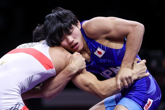 (260209) -- ZAGREB, Feb. 9, 2026 (Xinhua) -- Gomi Koto (R) of Japan competes against Alisher Ganiev of Uzbekistan during the Men's Greco-Roman 60kg weight class gold medal match at the UWW Grand Prix Ranking Series Zagreb Open 2026 in Zagreb, Croatia, Feb. 8, 2026. (Photo by Igor Kralj/PIXSELL via Xinhua)