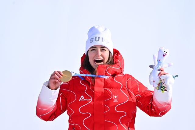 (260209) -- LIVIGNO, Feb. 9, 2026 (Xinhua) -- Gold medalist Mathilde Gremaud of Switzerland reacts during the awarding ceremony for the freestyle skiing women's freeski slopestyle at the Milan-Cortina 2026 Olympic Winter Games in Livigno, Italy, Feb. 9, 2026. (Xinhua/Zhang Hongxiang)