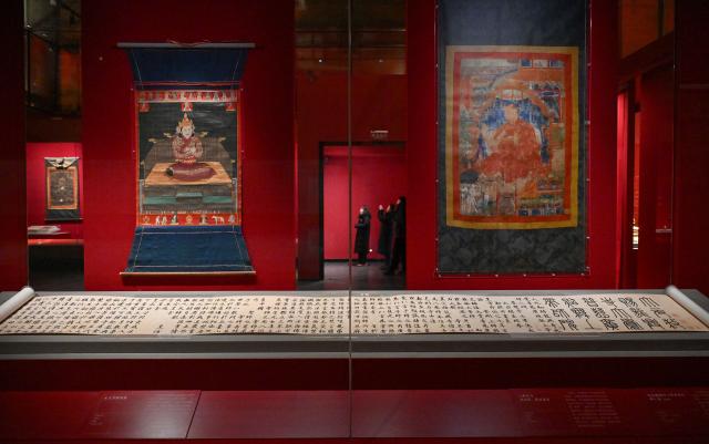 (260209) -- BEIJING, Feb. 9, 2026 (Xinhua) -- People visit the exhibition "Beyond Time: the history, culture and art of Sakya Monastery" at the Palace Museum in Beijing, capital of China, Feb. 9, 2026. The exhibition, which will last till May 10, showcases over 200 relics reflecting the history, culture and art of Sakya Monastery, the earliest monastery of the Sakya Sect of the Tibetan Buddhism. (Xinhua/Li Xin)