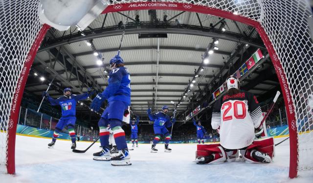 (260209) -- MILAN, Feb. 9, 2026 (Xinhua) -- Matilde Fantin (L, front) of Italy celebrates her goal during the ice hockey women's preliminary round group B match between Japan and Italy at the Milan-Cortina 2026 Olympic Winter Games in Milan, Italy, Feb. 9, 2026. (Xinhua/Tao Xiyi)