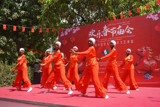 (260209) -- ABUJA, Feb. 9, 2026 (Xinhua) -- Nigerian students perform during a temple fair to mark the 2026 Spring Festival celebrations and commemorate the 55th anniversary of diplomatic relations between China and Nigeria in Abuja, Nigeria, Feb. 7, 2026. The Chinese community in Nigeria's capital city of Abuja, together with Nigerian partners, on Saturday held the event. (China Cultural Center in Abuja/Handout via Xinhua)