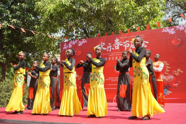 (260209) -- ABUJA, Feb. 9, 2026 (Xinhua) -- Nigerian students perform during a temple fair to mark the 2026 Spring Festival celebrations and commemorate the 55th anniversary of diplomatic relations between China and Nigeria in Abuja, Nigeria, Feb. 7, 2026. The Chinese community in Nigeria's capital city of Abuja, together with Nigerian partners, on Saturday held the event. (China Cultural Center in Abuja/Handout via Xinhua)