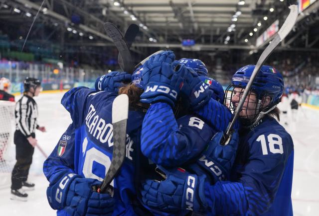 (260209) -- MILAN, Feb. 9, 2026 (Xinhua) -- Players of Italy celebrate a goal during the ice hockey women's preliminary round group B match between Japan and Italy at the Milan-Cortina 2026 Olympic Winter Games in Milan, Italy, Feb. 9, 2026. (Xinhua/Tao Xiyi)