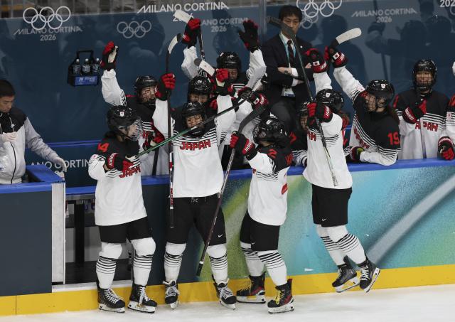 (260209) -- MILAN, Feb. 9, 2026 (Xinhua) -- Players of Japan celebrate a goal during the ice hockey women's preliminary round group B match between Japan and Italy at the Milan-Cortina 2026 Olympic Winter Games in Milan, Italy, Feb. 9, 2026. (Xinhua/Meng Chenguang)