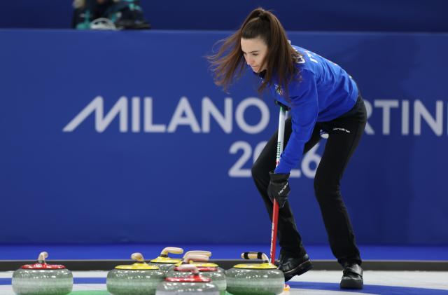 (260209) -- CORTINA D'AMPEZZO, Feb. 9, 2026 (Xinhua) -- Stefania Constantini of Italy competes competes during the curling mixed doubles semi-final between Italy and the United States at the Milan-Cortina 2026 Olympic Winter Games in Cortina, Italy, Feb. 9, 2026. (Xinhua/Ding Xu)