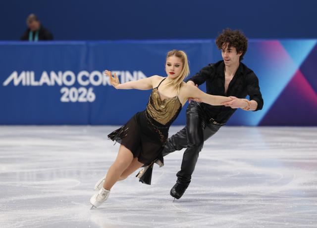 (260209) -- MILAN, Feb. 9, 2026 (Xinhua) -- Sofia Val (R)/Asaf Kazimov of Spain compete during the rhythm dance of figure skating ice dance competition at the Milan-Cortina 2026 Olympic Winter Games in Milan, Italy, Feb. 9, 2026. (Xinhua/Chen Yichen)
