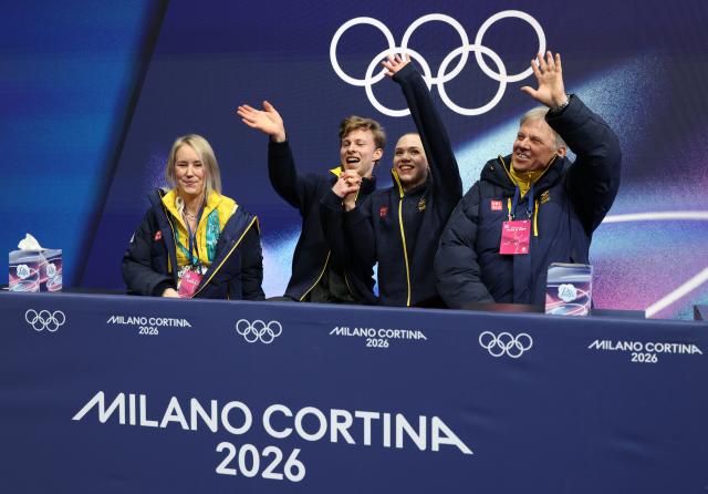 (260209) -- MILAN, Feb. 9, 2026 (Xinhua) -- Milla Ruud Reitan (2nd R)/Nikolaj Majorov (2nd L) of Sweden wait for their score during the rhythm dance of figure skating ice dance competition at the Milan-Cortina 2026 Olympic Winter Games in Milan, Italy, Feb. 9, 2026. (Xinhua/Chen Yichen)