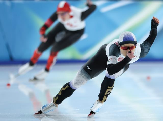 (260209) -- MILAN, Feb. 9, 2026 (Xinhua) -- Yamada Rio of Japan competes during the match of speed skating women's 1000m at the Milan-Cortina 2026 Olympic Winter Games in Milan, Italy, Feb. 9, 2026. (Xinhua/Li Jing)