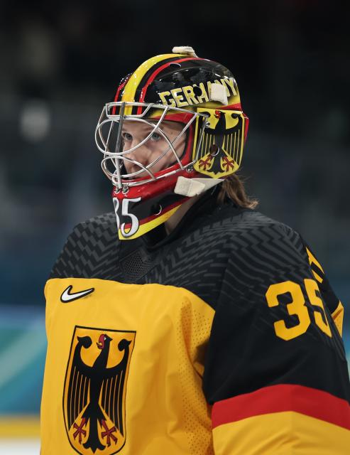 (260209) -- MILAN, Feb. 9, 2026 (Xinhua) -- Goalkeeper Sandra Abstreiter of Germany reacts before the ice hockey women's preliminary round group B match between Germany and France at the Milan-Cortina 2026 Olympic Winter Games in Milan, Italy, Feb. 9, 2026. (Xinhua/Wang Kaiyan)
