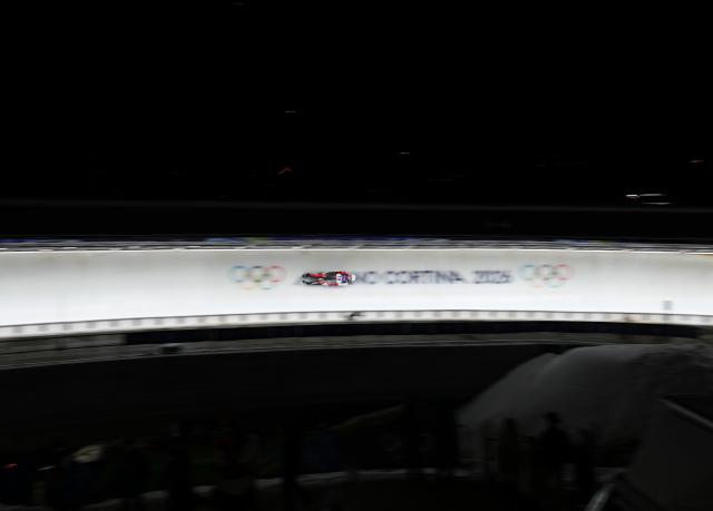 (260209) -- CORTINA D'AMPEZZO, Feb. 9, 2026 (Xinhua) -- Embyr-Lee Susko of Canada competes during the luge women's singles run 2 at the Milan-Cortina 2026 Olympic Winter Games in Cortina, Italy, Feb. 9, 2026. (Xinhua/Li Gang)