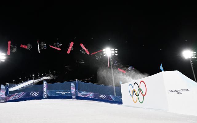 (260209) -- LIVIGNO, Feb. 9, 2026 (Xinhua) -- This multi-exposure photo shows Yu Seungeun of South Korea competing during the snowboard women's big air final match at the Milan-Cortina 2026 Olympic Winter Games in Livigno, Italy, Feb. 9, 2026. (Xinhua/Xia Yifang)