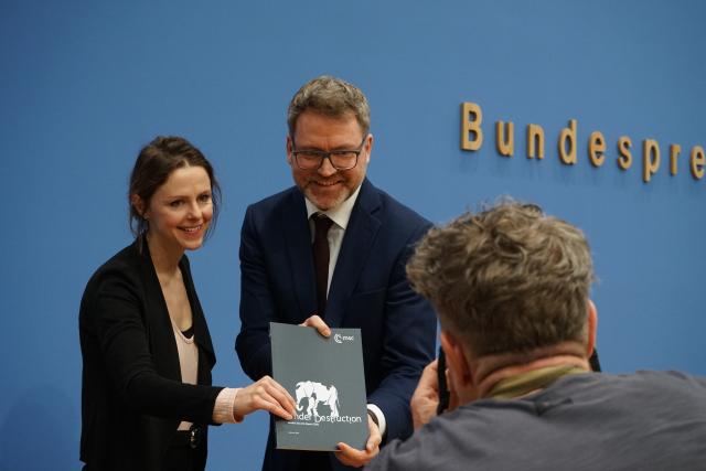 (260209) -- BERLIN, Feb. 9, 2026 (Xinhua) -- Organizers of Munich Security Conference display the Munich Security Report 2026 in Berlin, Germany, Feb. 9, 2026. The world has entered a period of "wrecking-ball politics," where sweeping destruction has become the order of the day, according to the Munich Security Report 2026 released here on Monday. (Xinhua/Li Chao)