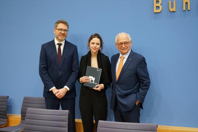 (260209) -- BERLIN, Feb. 9, 2026 (Xinhua) -- Organizers of Munich Security Conference display the Munich Security Report 2026 in Berlin, Germany, Feb. 9, 2026. The world has entered a period of "wrecking-ball politics," where sweeping destruction has become the order of the day, according to the Munich Security Report 2026 released here on Monday. (Xinhua/Li Chao)