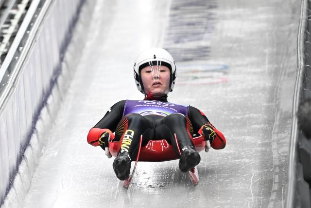 (260209) -- CORTINA D'AMPEZZO, Feb. 9, 2026 (Xinhua) -- Wang Peixuan of China competes during the luge women's singles run 1 at the Milan-Cortina 2026 Olympic Winter Games in Cortina, Italy, Feb. 9, 2026. (Xinhua/Lian Yi)