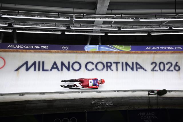 (260209) -- CORTINA D'AMPEZZO, Feb. 9, 2026 (Xinhua) -- Elina Bota of Latvia competes during the luge women's singles run 2 at the Milan-Cortina 2026 Olympic Winter Games in Cortina, Italy, Feb. 9, 2026. (Xinhua/Lian Yi)