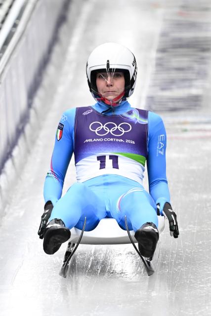 (260209) -- CORTINA D'AMPEZZO, Feb. 9, 2026 (Xinhua) -- Verena Hofer of Italy competes during the luge women's singles run 1 at the Milan-Cortina 2026 Olympic Winter Games in Cortina, Italy, Feb. 9, 2026. (Xinhua/Lian Yi)