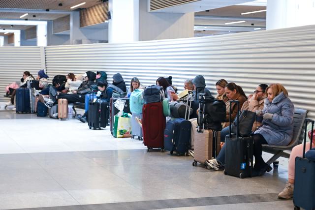 (260209) -- MADRID, Feb. 9, 2026 (Xinhua) -- Passengers wait at a railway station during a train drivers' strike in Madrid, Spain, Feb. 9, 2026. Unions representing Spain's train drivers on Monday announced the cancellation of the second and third days of strike action planned for Tuesday and Wednesday following talks with the Ministry of Transport. The strike, scheduled from Feb. 9 to 11, was called to demand improved safety measures in the wake of recent rail accidents. (Photo by Gustavo Valiente/Xinhua)