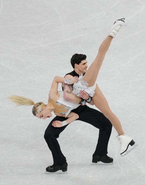(260210) -- MILAN, Feb. 10, 2026 (Xinhua) -- Piper Gilles (front)/Paul Poirier of Canada compete during the rhythm dance of figure skating ice dance competition at the Milan-Cortina 2026 Olympic Winter Games in Milan, Italy, Feb. 9, 2026. (Xinhua/Xue Yuge)