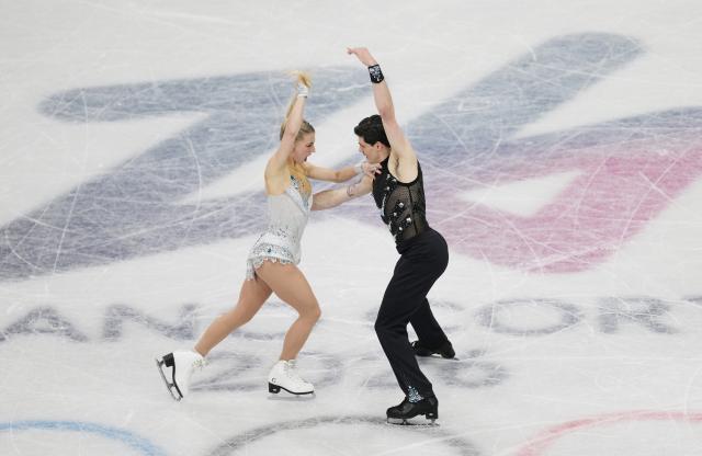 (260210) -- MILAN, Feb. 10, 2026 (Xinhua) -- Piper Gilles (L)/Paul Poirier of Canada compete during the rhythm dance of figure skating ice dance competition at the Milan-Cortina 2026 Olympic Winter Games in Milan, Italy, Feb. 9, 2026. (Xinhua/Xue Yuge)