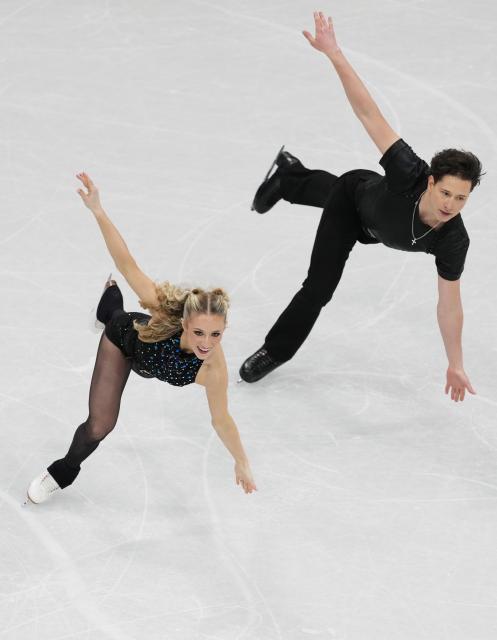 (260210) -- MILAN, Feb. 10, 2026 (Xinhua) -- Emilea Zingas (R)/Vadym Kolesnik of the United States compete during the rhythm dance of figure skating ice dance competition at the Milan-Cortina 2026 Olympic Winter Games in Milan, Italy, Feb. 9, 2026. (Xinhua/Xue Yuge)