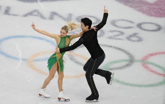 (260210) -- MILAN, Feb. 10, 2026 (Xinhua) -- Holly Harris (L)/Jason Chan of Australia perform during the rhythm dance of figure skating ice dance competition at the Milan-Cortina 2026 Olympic Winter Games in Milan, Italy, Feb. 9, 2026. (Xinhua/Xue Yuge)