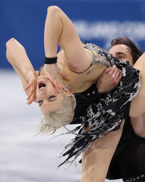 (260210) -- MILAN, Feb. 10, 2026 (Xinhua) -- Olivia Smart (front)/Tim Dieck of Spain perform during the rhythm dance of figure skating ice dance competition at the Milan-Cortina 2026 Olympic Winter Games in Milan, Italy, Feb. 9, 2026. (Xinhua/Chen Yichen)