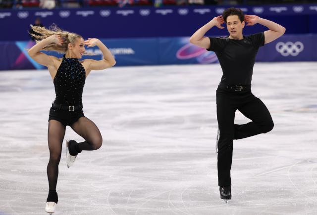 (260210) -- MILAN, Feb. 10, 2026 (Xinhua) -- Emilea Zingas (L)/Vadym Kolesnik of the United States perform during the rhythm dance of figure skating ice dance competition at the Milan-Cortina 2026 Olympic Winter Games in Milan, Italy, Feb. 9, 2026. (Xinhua/Chen Yichen)