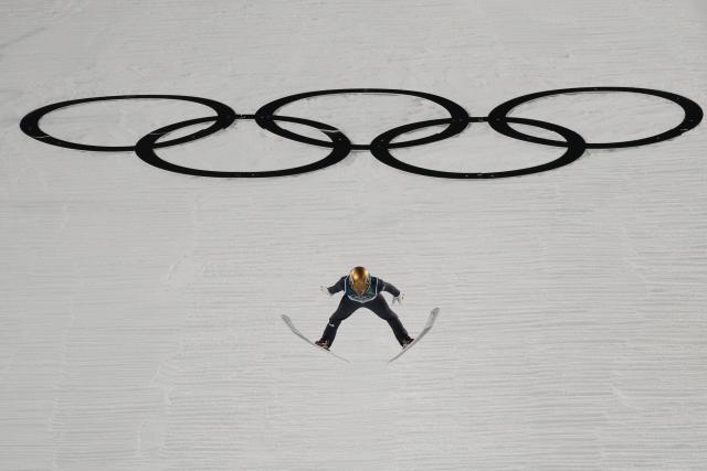 (260210) -- PREDAZZO, Feb. 10, 2026 (Xinhua) -- Philipp Raimund of Germany competes during the Ski Jumping Men's Normal Hill Individual of the 2026 Milan-Cortina Winter Olympics in Predazzo, Italy, Feb. 9, 2026. (Xinhua/Meng Yongmin)