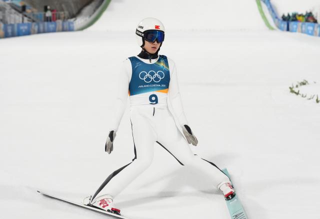 (260210) -- PREDAZZO, Feb. 10, 2026 (Xinhua) -- Song Qiwu of China competes during the Ski Jumping Men's Normal Hill Individual of the 2026 Milan-Cortina Winter Olympics in Predazzo, Italy, Feb. 9, 2026. (Xinhua/Meng Yongmin)